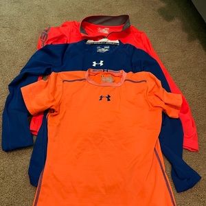 Under Armour tops. Boys large.